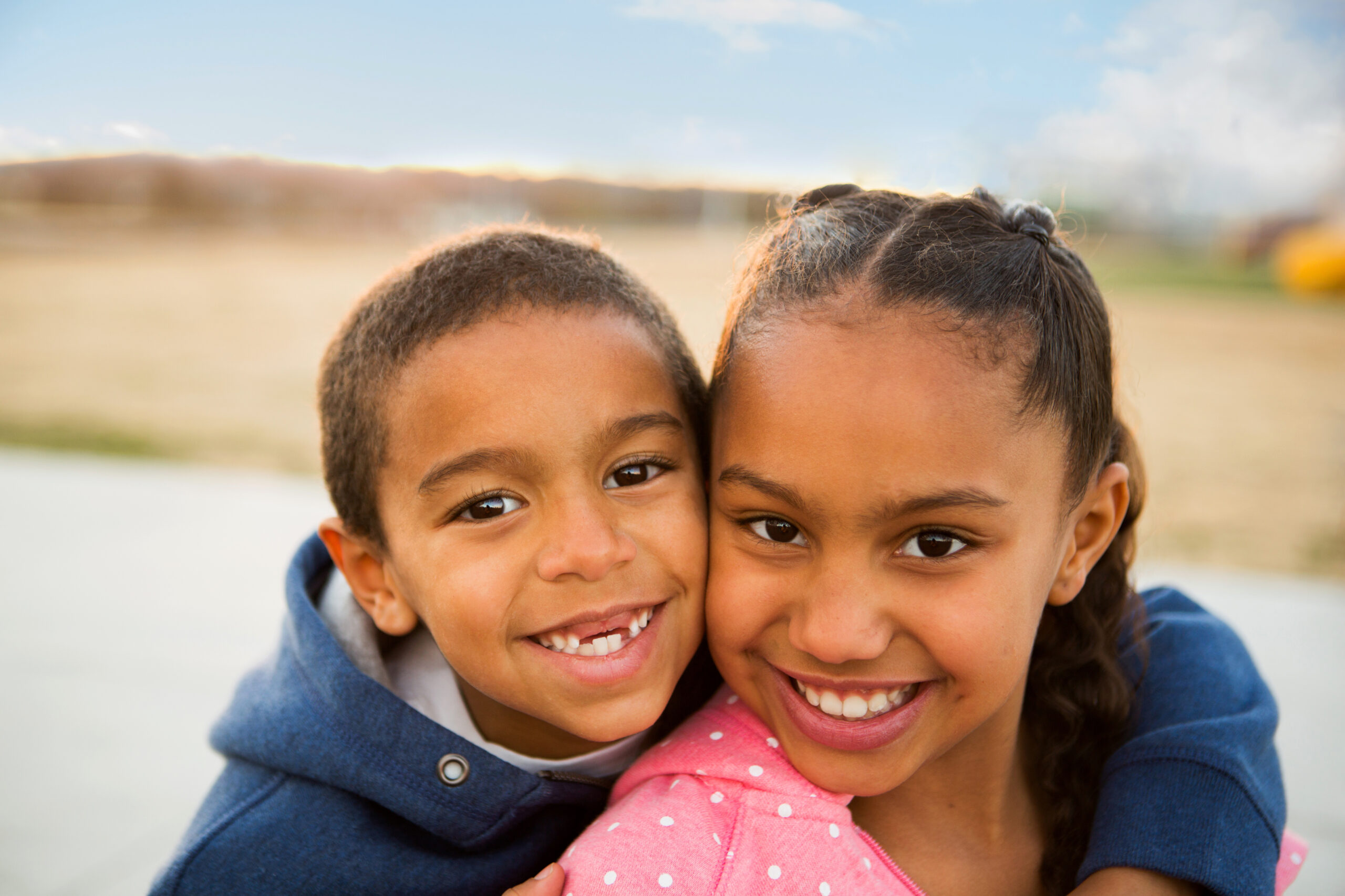 Little boy and his big sister.